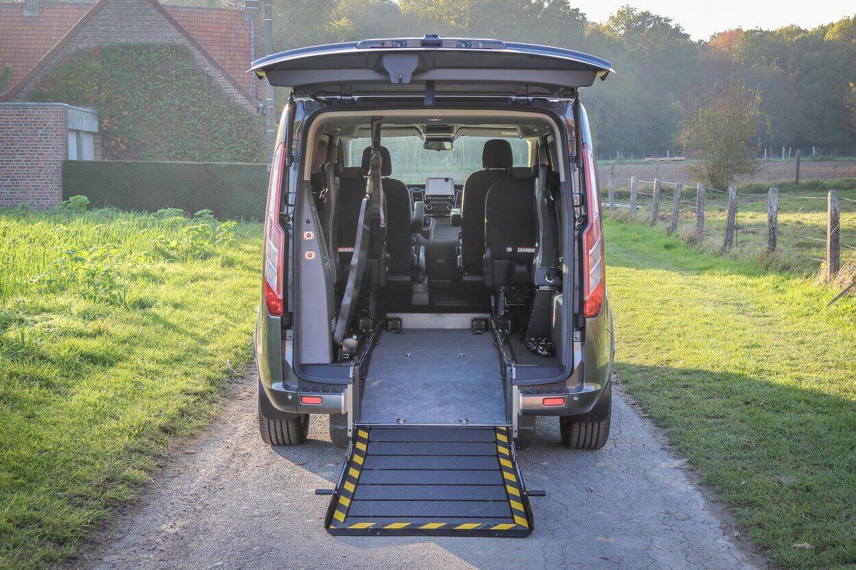 The wheelchair passenger has all the safety equipments and belts into this wheelchair friendly Ford ! 