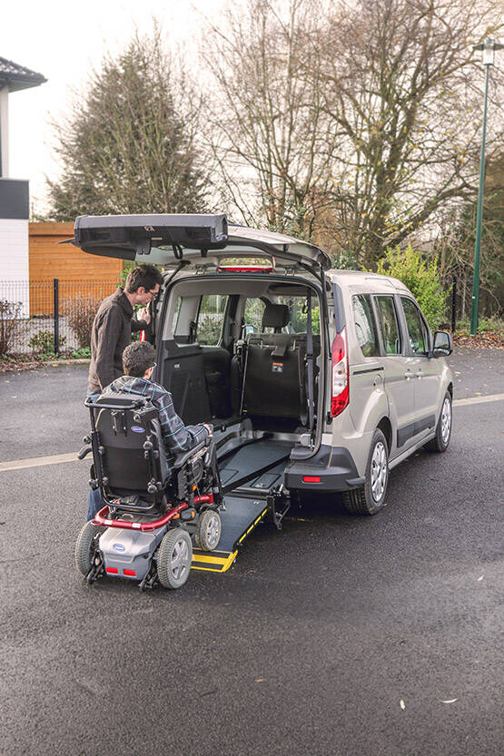 You can attach some of the straps of the wheelchair from the bottom of the ramp